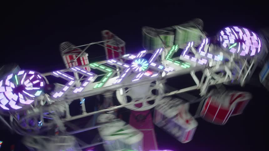 A footage of a roller coaster at an amusement park