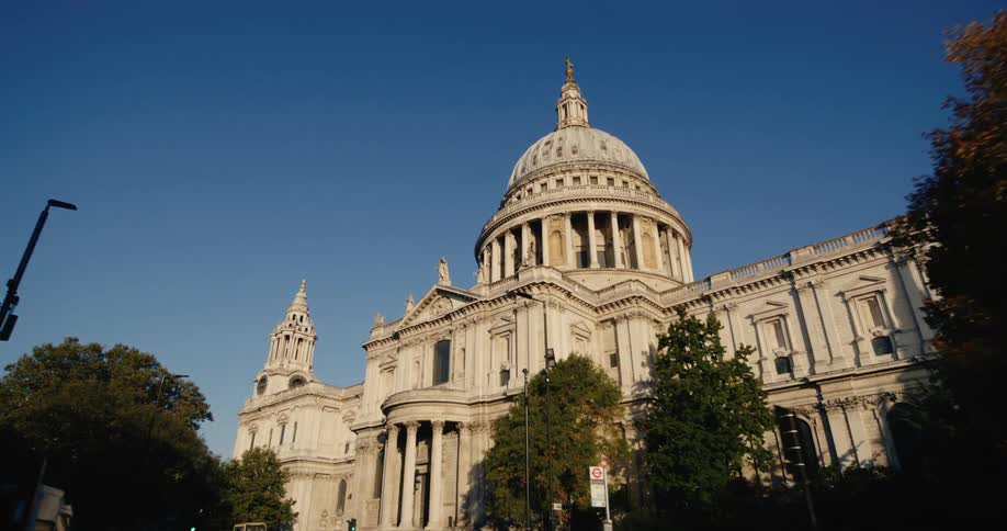 Londons grand st pauls cathedral stands out against the clear blue sky