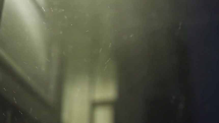 Snow lightly falls at night