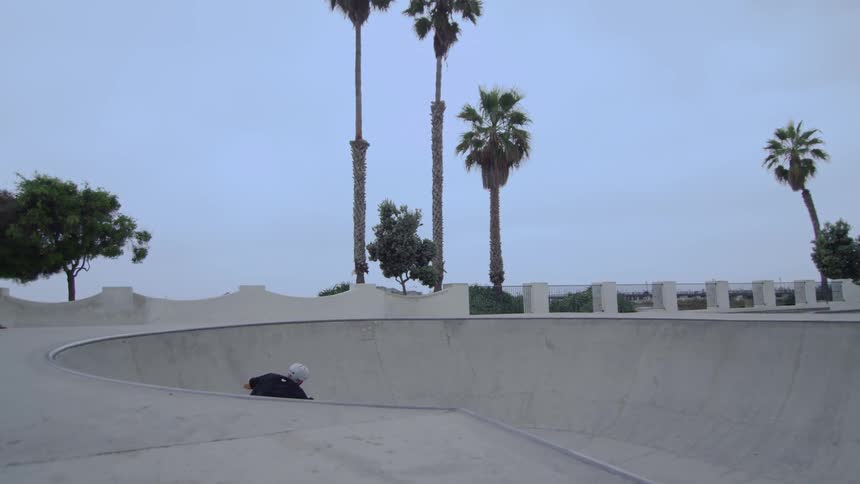 Man riding a bmx bike in a park