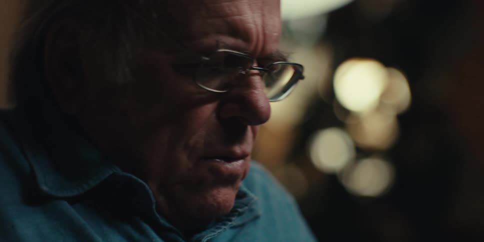 A clip of an elderly man adjusting himself