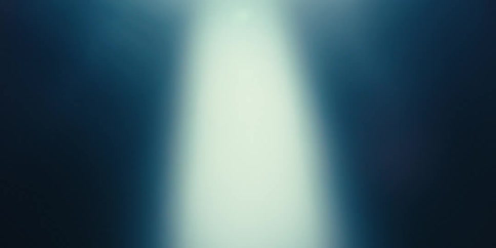 Abstract light illuminating a dark area