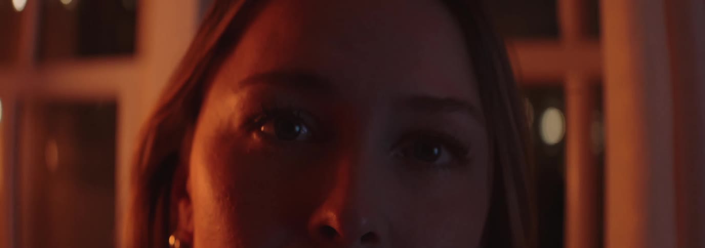 Portrait of a woman in a room at night