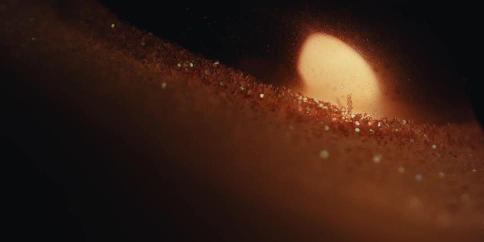 Reflection of a small flame going out