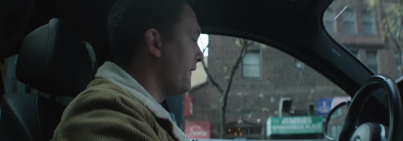 A clip of a person driving in a car