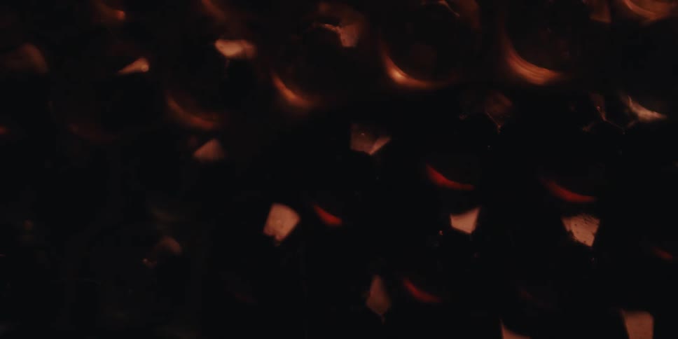 The light reflects off the crystal orbs