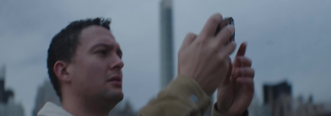 A clip of a person holding a smartphone