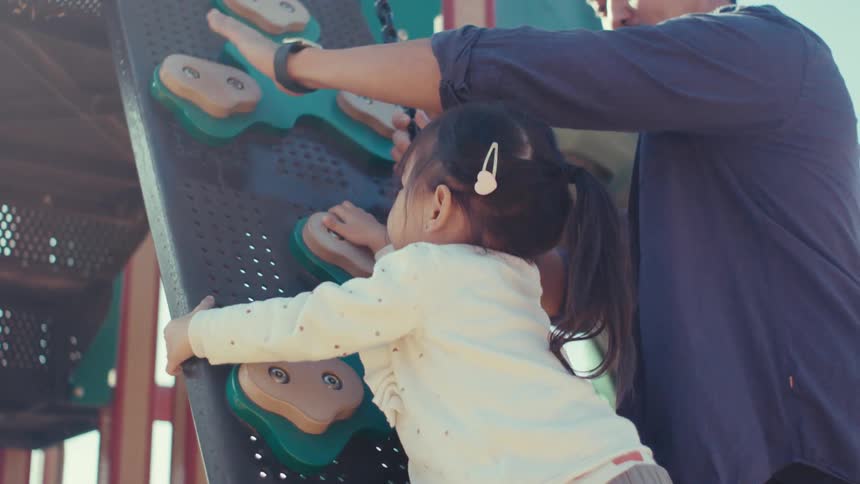 A clip of a father teaching his daughter