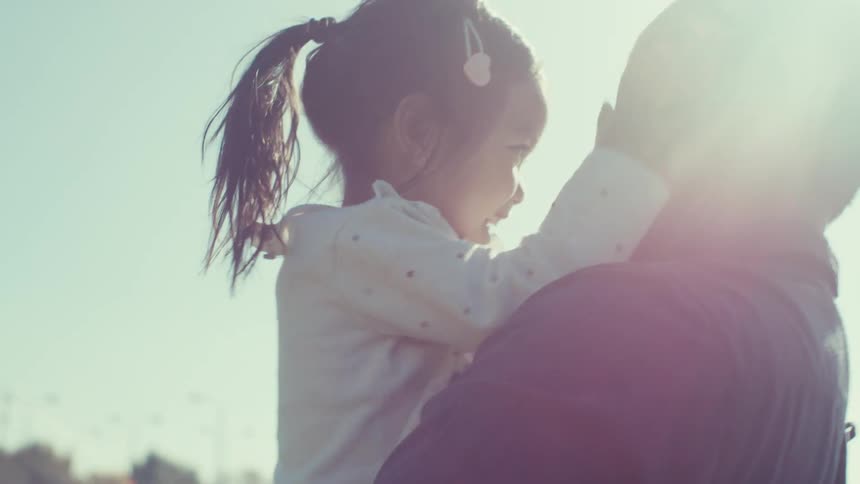 A clip of a father and a daughter playing