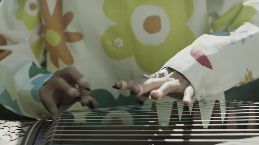 A clip of a person playing a musical instrument