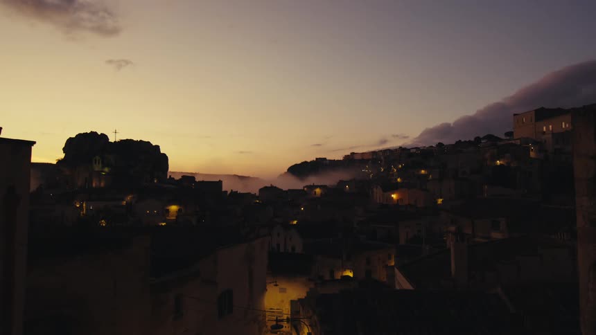 The sun is setting on the village