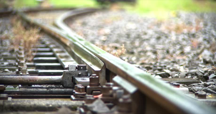 Close up of a train track adjusting its route