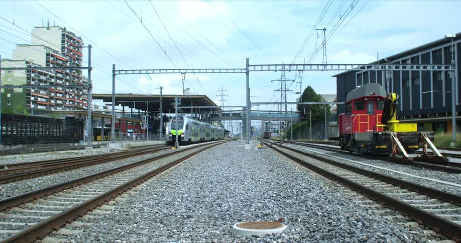 Moving train arriving at a station