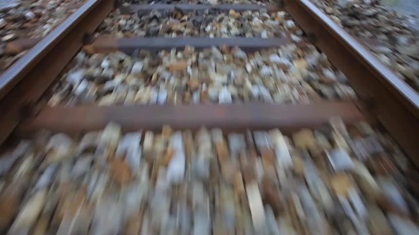 Moving view passing by train track
