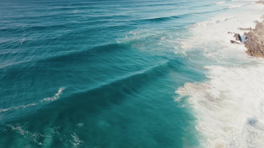 Aerial view of waves in a rough sea