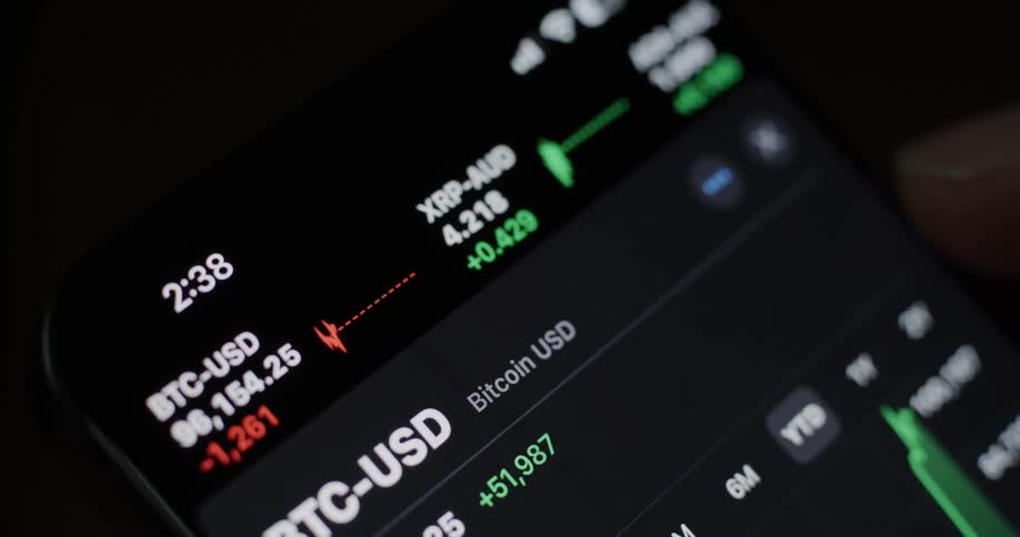 Closeup of an iphone screen displaying stock market data