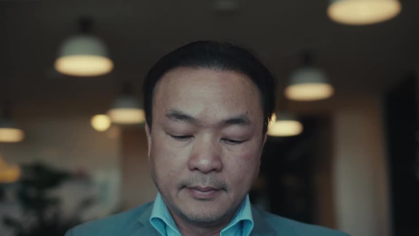 A clip of an asian person
