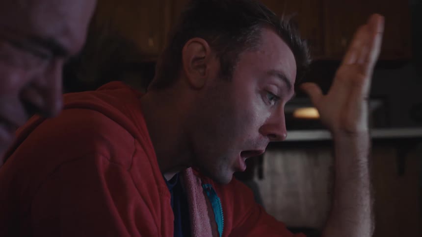 A clip of two men having a conversation