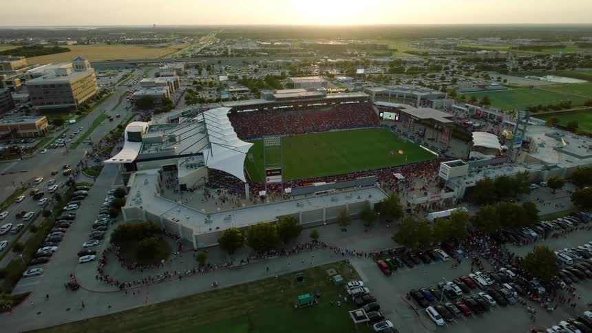 An aerial clip of a stadium in a community