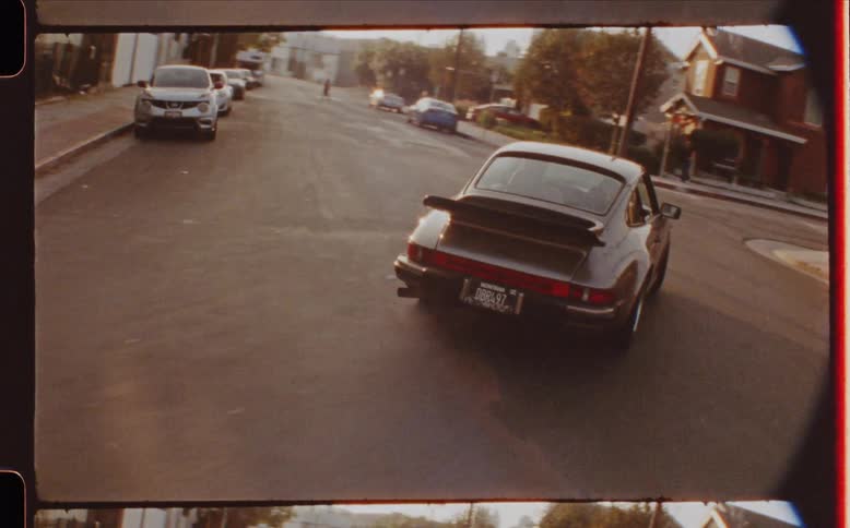 A car drives and turns in town