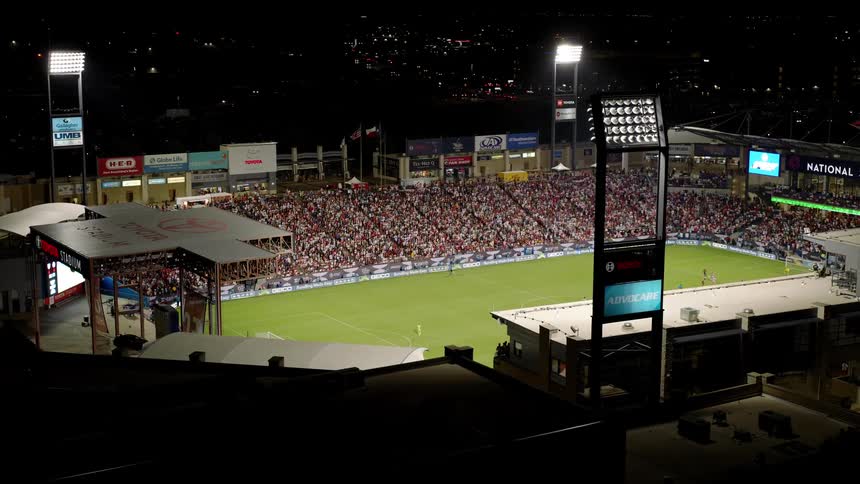 A game is going on at night in the stadium