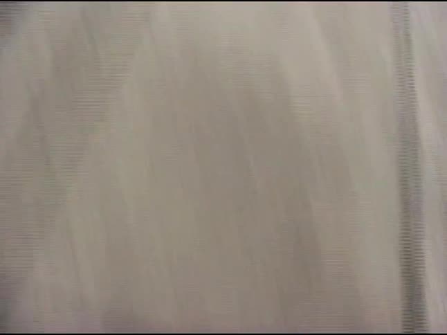 A teenager rings the doorbell on the home and runs