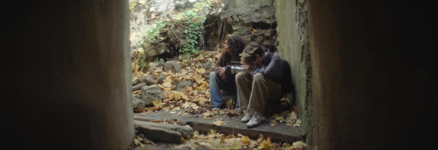 Two friends are talking outside