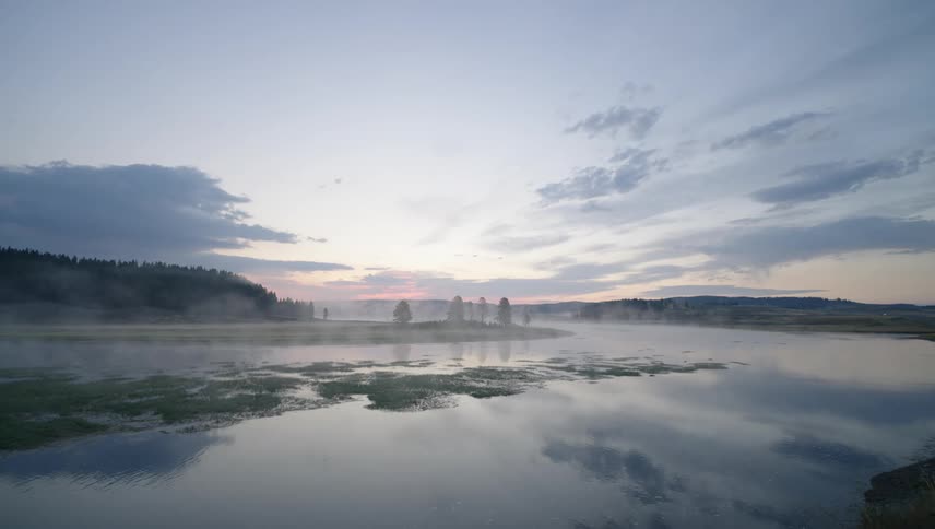 Clouds reflected on the still waters of a moor
