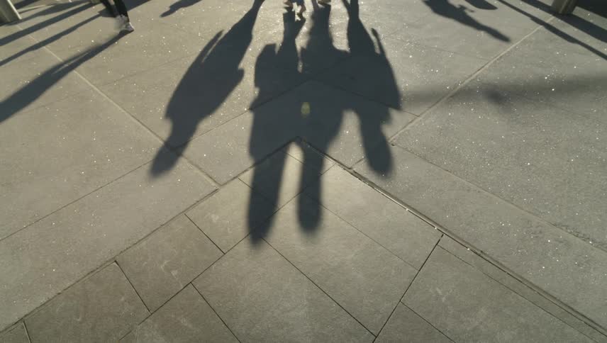 Pedestrians walking outdoors in a metropolitan environment
