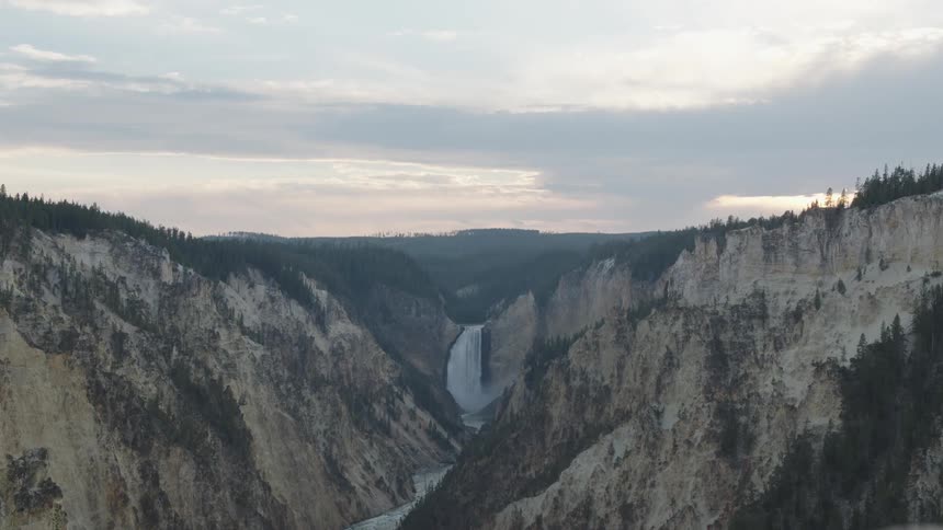 An aerial clip of a mountainous waterfall