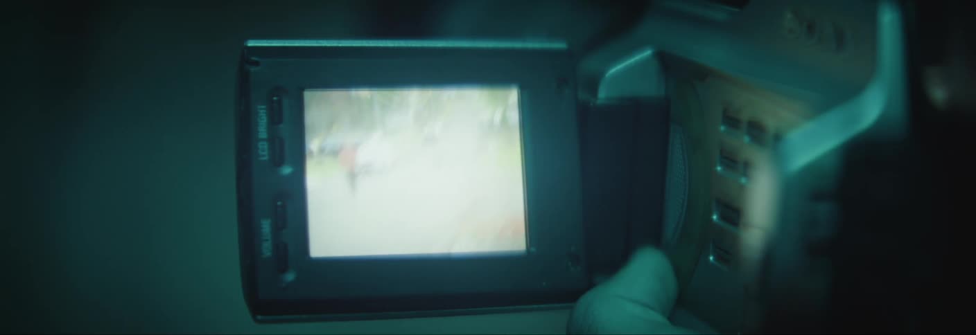 Footage is playing on the camcorder display