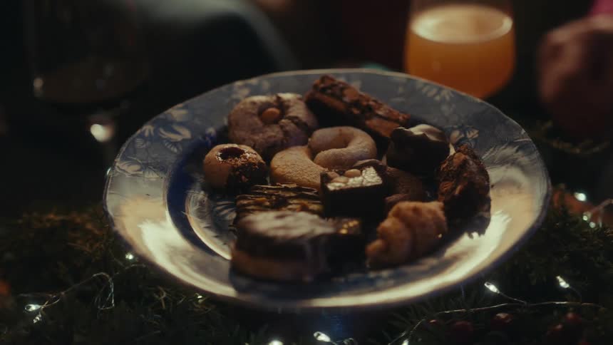 People take a cookie and a drink