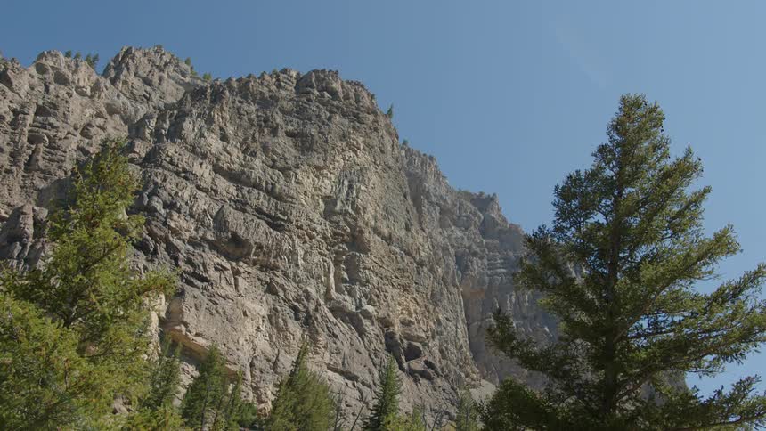 The sky is clear over the mountain
