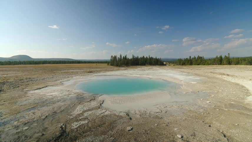 A puddle of water in a dry area