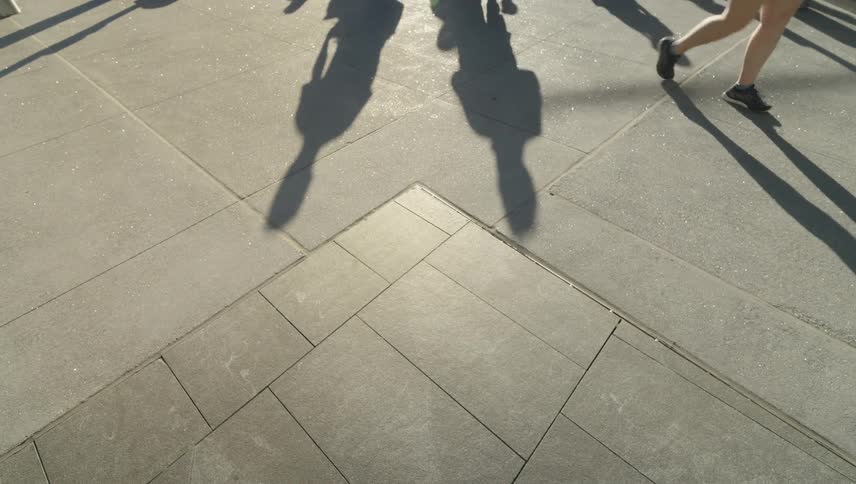 Pedestrians are walking on the sidewalk