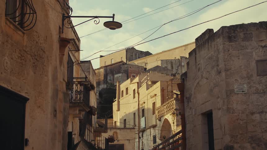 Narrow street with houses with classic and historic architecture