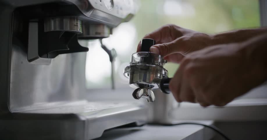 A clip of a person making a coffee