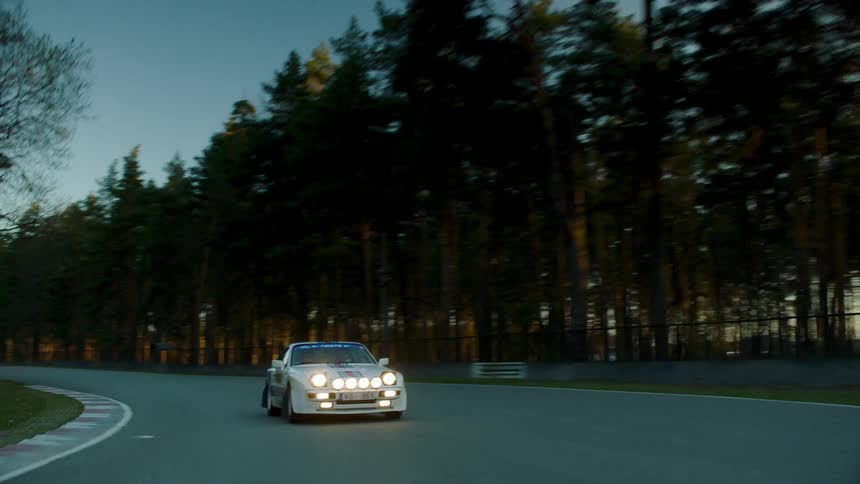 A car is racing around the track