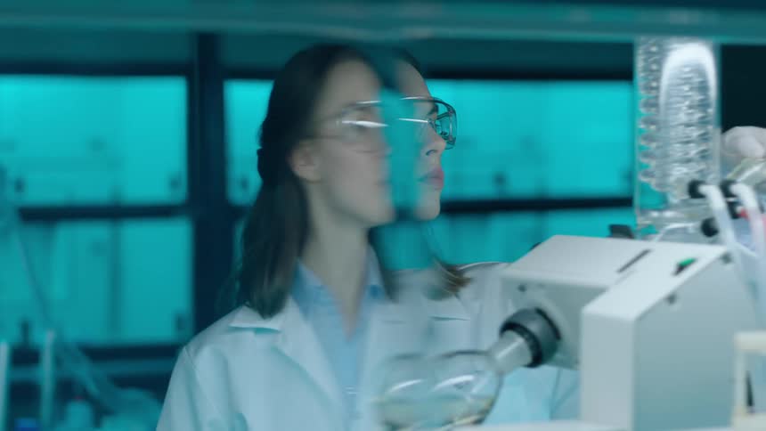 A clip of a lady working in a lab