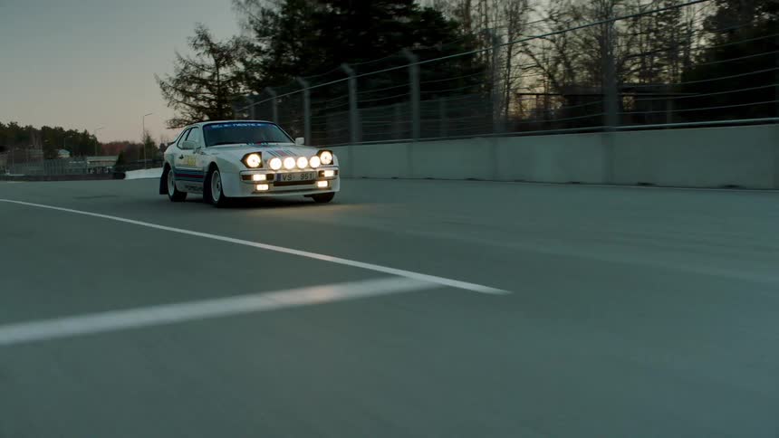 Sports car driving on a track