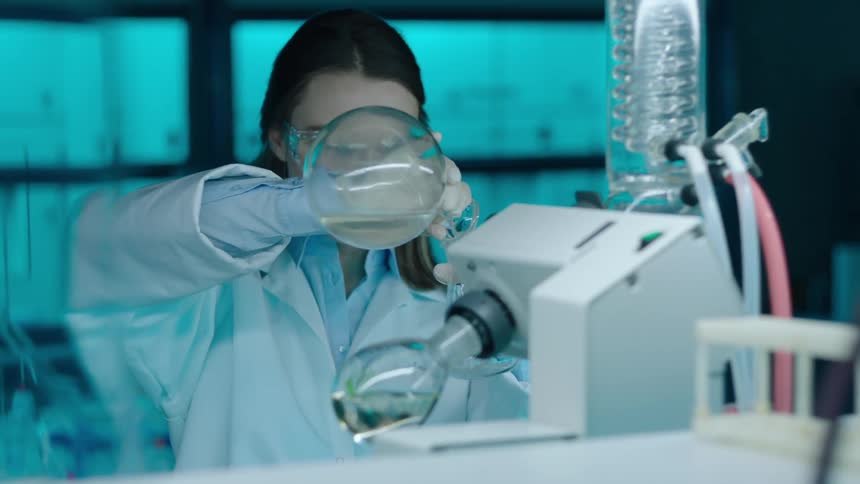 A clip of a person experimenting in the lab