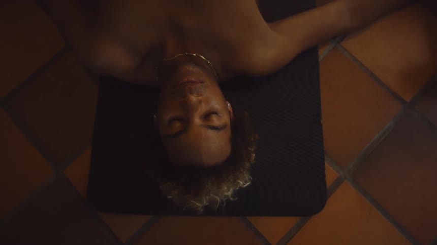 A man is laying on the ground