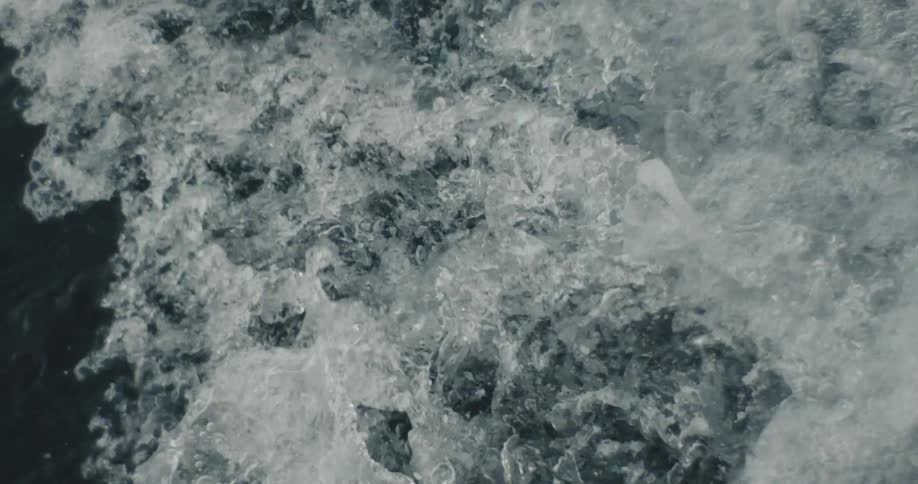 The ocean water splashes up