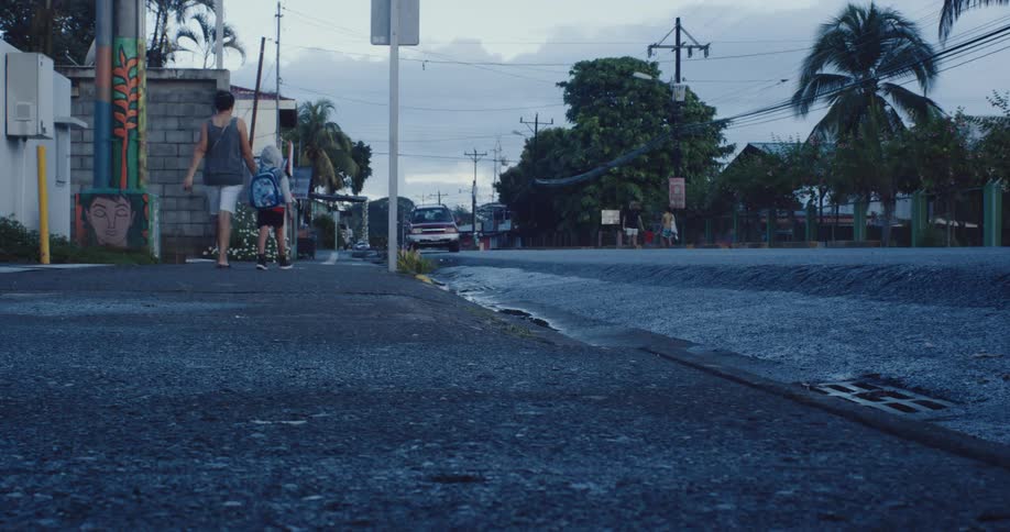 A clip of people walking down the street
