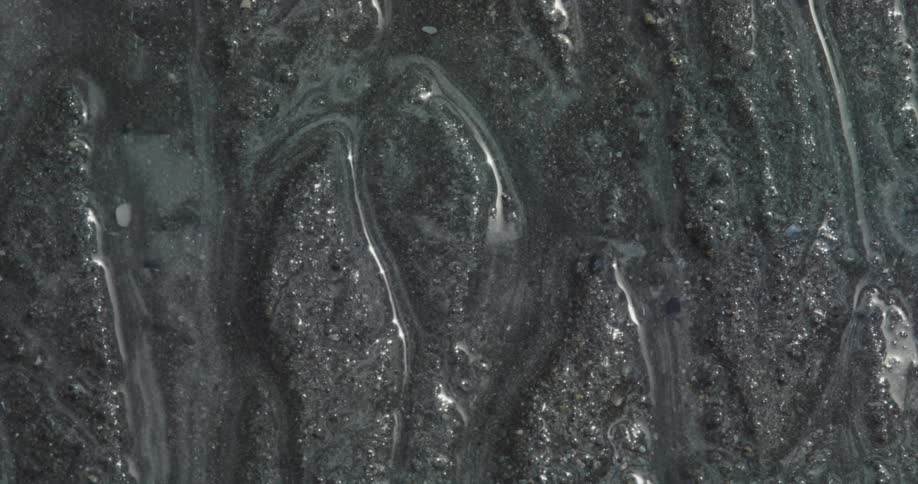 Water runs through the mud