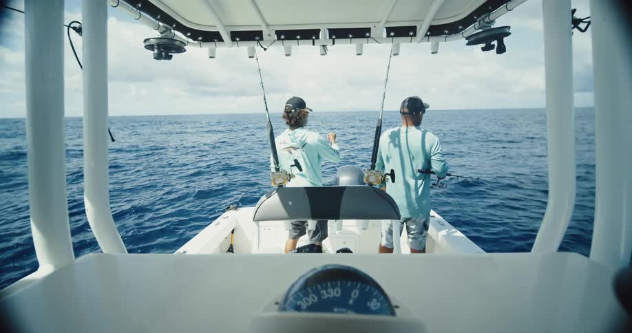 Two men are fishing on a cloudy day
