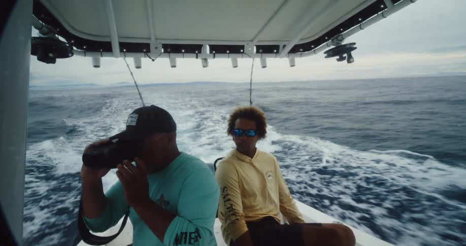 A clip of people riding a boat in the sea