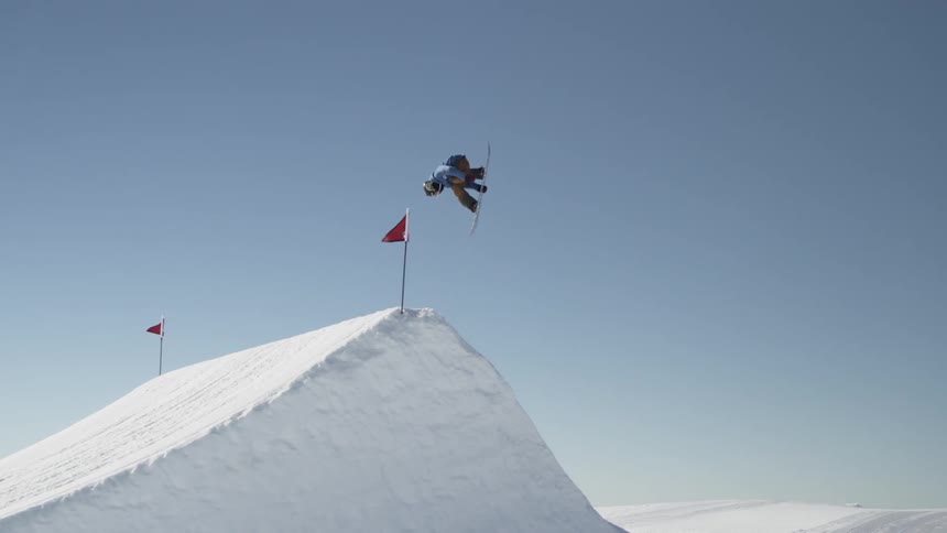 People skiing on a slope on a sunny day