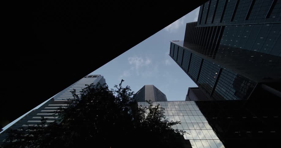 Upward view of modern skyscrapers in an urban city