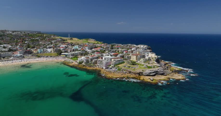 Aerial of hotels in a destination location on an ocean promontory